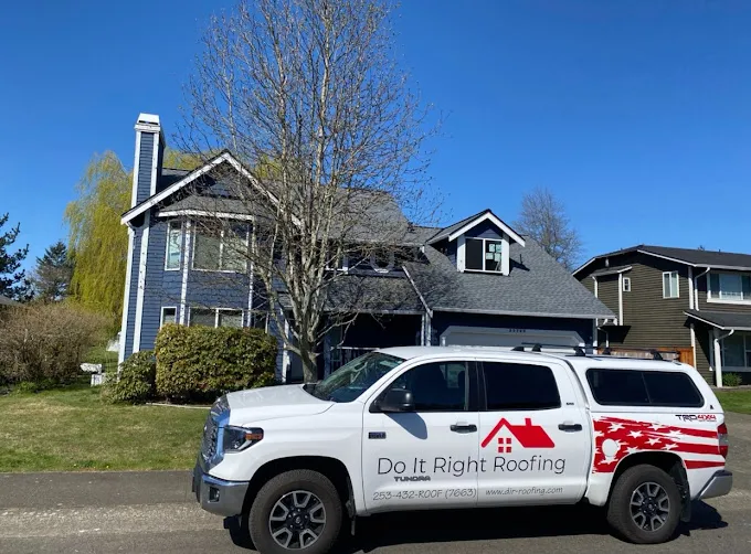 Roofing truck in residential neighborhood
